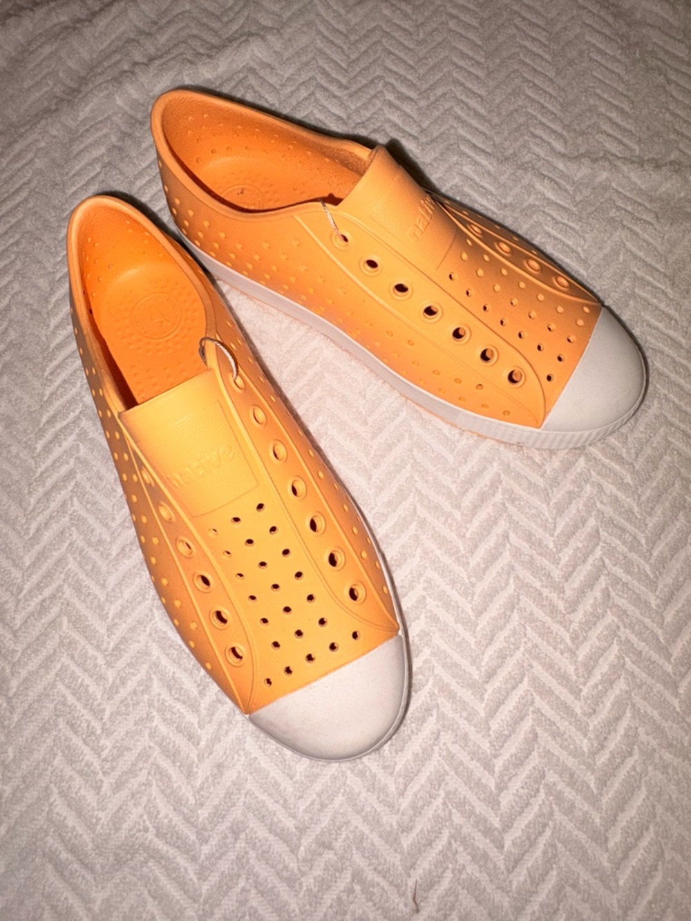 Native Shoes Orange Slip-On Sneakers with White Toe